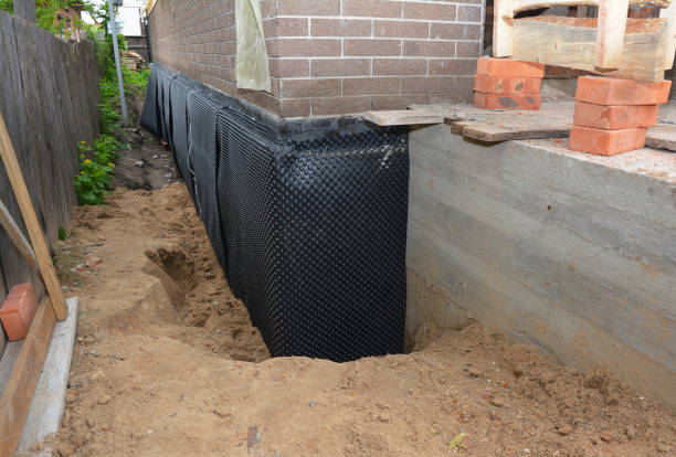 SJ Waterproofing Pros technician performing targeted Interior Drainage System assessment in Etlan, VA